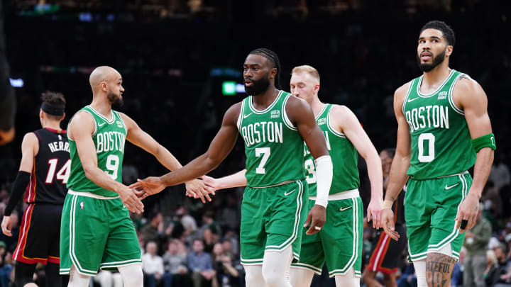 Apr 24, 2024; Boston, Massachusetts, USA; Boston Celtics guard Jaylen Brown (7), forward Jayson Tatum, and guard Derrick White high five during Game 2 vs. the Miami Heat. Apr 24, 2024; Boston, Massachusetts, USA; Boston Celtics guard Jaylen Brown (7), forward Jayson Tatum, and guard Derrick White high five during Game 2 vs. the Miami Heat.