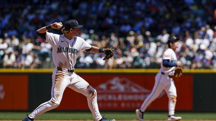 Jun 18, 2026; Seattle, Washington, USA; Seattle Mariners shortstop Colt Emerson (4) throws to first base against the Baltimore Orioles during the third inning at T-Mobile Park. Mandatory Credit: Joe Nicholson-Imagn Images
