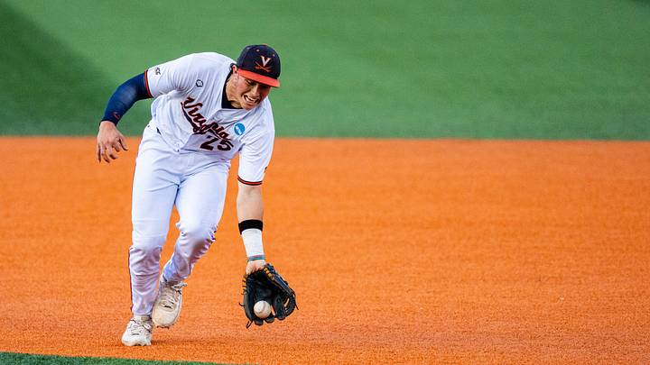 Virginia infielder Joe Tiroly (25) fields the ball during an NCAA Baseball Regional game between Virginia and Jax State at Pete Taylor Park in Hattiesburg, Miss., on Friday, May 29, 2026. Virginia infielder Joe Tiroly (25) fields the ball during an NCAA Baseball Regional game between Virginia and Jax State at Pete Taylor Park in Hattiesburg, Miss., on Friday, May 29, 2026.