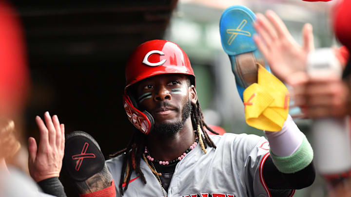 Sep 29, 2024; Chicago, Illinois, USA; Cincinnati Reds shortstop Elly De La Cruz (44) celebrates with teammates in the dugout after scoring during the tenth inning against the Chicago Cubs at Wrigley Field. Mandatory Credit: Patrick Gorski-Imagn Images Sep 29, 2024; Chicago, Illinois, USA; Cincinnati Reds shortstop Elly De La Cruz (44) celebrates with teammates in the dugout after scoring during the tenth inning against the Chicago Cubs at Wrigley Field. Mandatory Credit: Patrick Gorski-Imagn Images