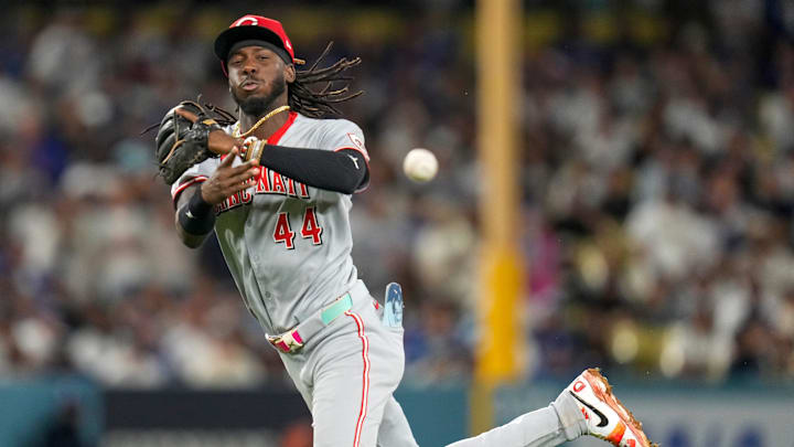 Cincinnati Reds shortstop Elly De La Cruz (44) throws for first to force out right fielder Teoscar Hernandez (37) in the seventh inning of the MLB National League Wild Card Game 2 between the Los Angeles Dodgers and the Cincinnati Reds at Dodger Stadium in Los Angeles on Wednesday, Oct. 1, 2025. The Reds were eliminated from the postseason with an 8-4 loss to the reining World Series Champions La Dodgers.
