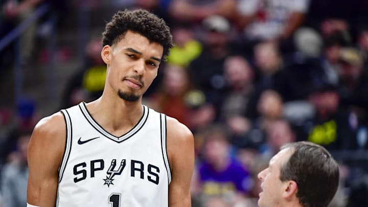 Victor Wembanyama considers something a referee says.