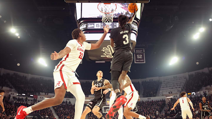 Jan 29, 2025; Starkville, Mississippi, USA; Mississippi State Bulldogs forward KeShawn Murphy (3) shoots against Alabama Crimson Tide forward Aiden Sherrell (22) during the first half at Humphrey Coliseum. Mandatory Credit: Wesley Hale-Imagn Images