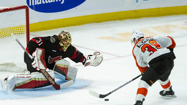 Apr 13, 2025; Ottawa, Ontario, CAN; Philadelphia Flyersright wing Matvei Michkov (39) lines up a shot on  Ottawa Senators goalie Anton Forsberg (31) in the third period at the Canadian Tire Centre. Mandatory Credit: Marc DesRosiers-Imagn Images