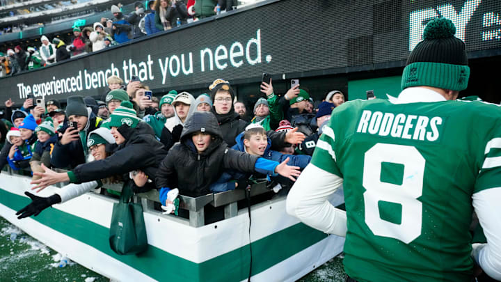 Young fans try to get the attention of New York Jets quarterback Aaron Rodgers (8) after the game, Sunday, December 22, 2024, in East Rutherford. Young fans try to get the attention of New York Jets quarterback Aaron Rodgers (8) after the game, Sunday, December 22, 2024, in East Rutherford.
