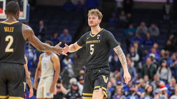 Dec 17, 2025; Memphis, Tennessee, USA; Vanderbilt Commodores guard Tyler Nickel (5) and guard Duke Miles (2) high five against the Memphis Tigers during the second half at FedExForum. Mandatory Credit: Wesley Hale-Imagn Images Dec 17, 2025; Memphis, Tennessee, USA; Vanderbilt Commodores guard Tyler Nickel (5) and guard Duke Miles (2) high five against the Memphis Tigers during the second half at FedExForum. Mandatory Credit: Wesley Hale-Imagn Images