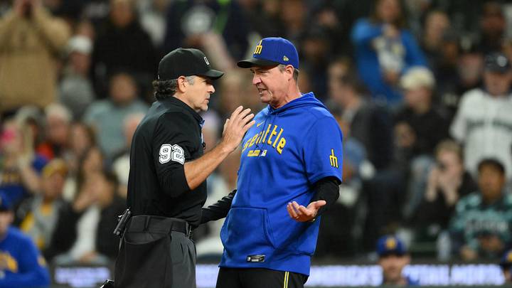 Sep 3, 2026; Seattle, Washington, USA; Home plate umpire James Hoye (92) and Seattle Mariners manager Dan Wilson after Wilson was ejected from the game during the sixth inning between the Seattle Mariners and the Athletics at T-Mobile Park. Mandatory Credit: Steven Bisig-Imagn Images Sep 3, 2026; Seattle, Washington, USA; Home plate umpire James Hoye (92) and Seattle Mariners manager Dan Wilson after Wilson was ejected from the game during the sixth inning between the Seattle Mariners and the Athletics at T-Mobile Park. Mandatory Credit: Steven Bisig-Imagn Images