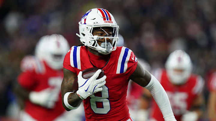 Dec 1, 2025; Foxborough, Massachusetts, USA; New England Patriots wide receiver Stefon Diggs (8) runs after a catch during the first quarter against the New York Giants at Gillette Stadium. Mandatory Credit: David Butler II-Imagn Images