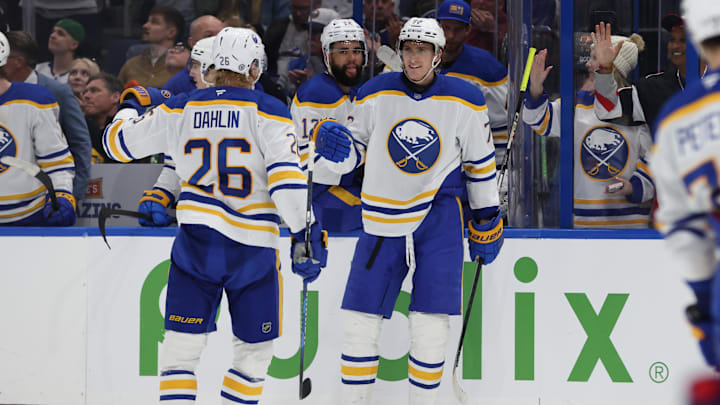 Mar 6, 2025; Tampa, Florida, USA; Buffalo Sabres center Tage Thompson (72) is congratulated by defenseman Rasmus Dahlin (26) after he scored a goal against the Tampa Bay Lightning during the second period at Amalie Arena. Mandatory Credit: Kim Klement Neitzel-Imagn Images