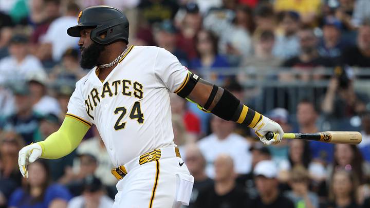 Jun 23, 2026; Pittsburgh, Pennsylvania, USA;  Pittsburgh Pirates designated hitter Marcell Ozuna (24) hits an RBI single against the Seattle Mariners during the second inning at PNC Park. Mandatory Credit: Charles LeClaire-Imagn Images