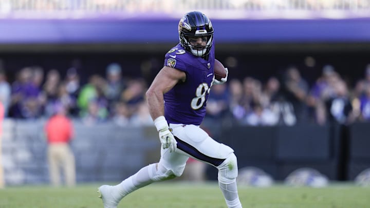 Nov 5, 2023; Baltimore, Maryland, USA;  Baltimore Ravens tight end Mark Andrews (89) runs with the ball against the Seattle Seahawks during the third quarter at M&T Bank Stadium. Mandatory Credit: Jessica Rapfogel-Imagn Images