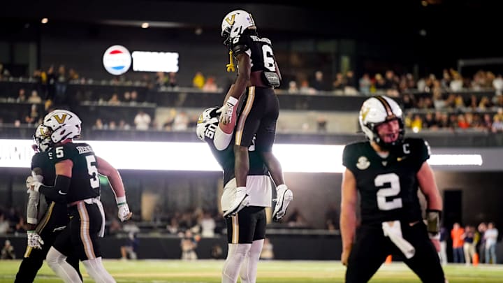 Vanderbilt wide receiver Tre Richardson (6) celebrates his touchdown against Auburn with offensive lineman Chase Mitchell (50) during the third quarter at FirstBank Stadium in Nashville, Tenn., Saturday, Nov. 8, 2025.