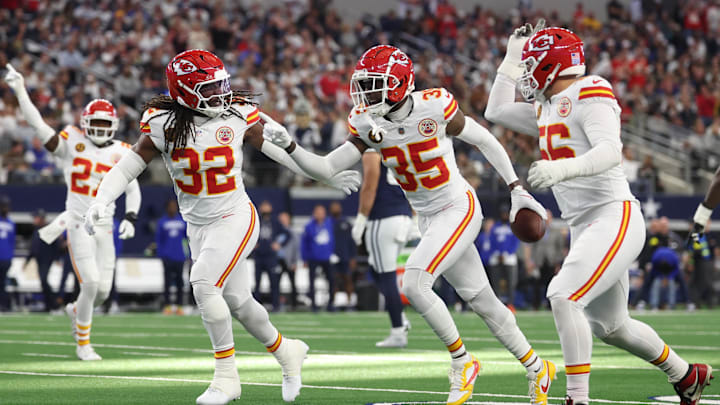 Nov 27, 2025; Arlington, Texas, USA; Kansas City Chiefs linebacker Nick Bolton (32) and Kansas City Chiefs cornerback Jaylen Watson (35) celebrate after an interception against the Dallas Cowboys during the first quarter at AT&T Stadium. Mandatory Credit: Kevin Jairaj-Imagn Images