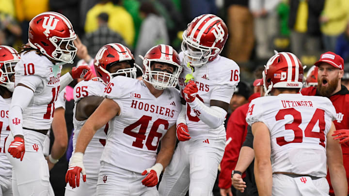 Oct 11, 2025; Eugene, Oregon, USA; Indiana Hoosiers linebacker Isaiah Jones (46) celebrates with defensive back Jah Jah Boyd (16), defensive back Ryland Gandy (10) and linebacker Jeff Utzinger (34) after intercepting a pass thrown by Oregon Ducks quarterback Dante Moore (5) (not pictured) during the fourth quarter at Autzen Stadium. Mandatory Credit: Troy Wayrynen-Imagn Images