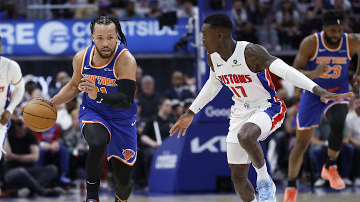 Apr 24, 2025; Detroit, Michigan, USA; New York Knicks guard Jalen Brunson (11) dribbles defended by Detroit Pistons guard Dennis Schroder (17) in the first half during game three of first round for the 2024 NBA Playoffs at Little Caesars Arena. Mandatory Credit: Rick Osentoski-Imagn Images