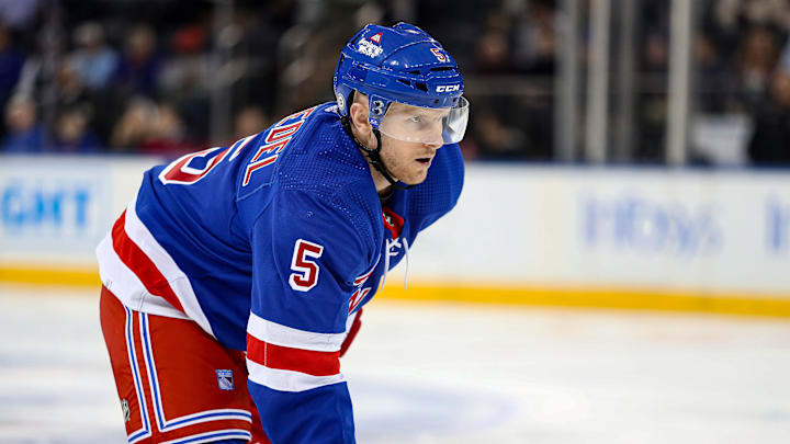 Mar 19, 2024; New York, New York, USA; New York Rangers defenseman Chad Ruhwedel (5) awaits a face-off against the Winnipeg Jets during the first period at Madison Square Garden. Mandatory Credit: Danny Wild-Imagn Images