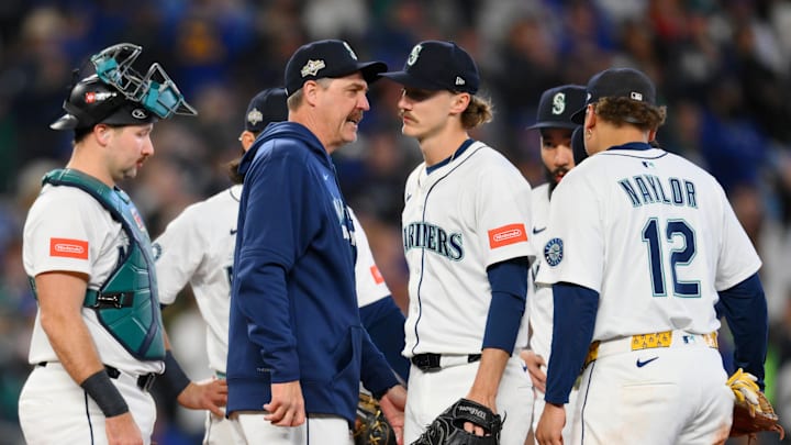 Oct 17, 2025; Seattle, Washington, USA; Seattle Mariners manager Dan Wilson (6) takes pitcher Bryce Miller (50) out of the game against the Toronto Blue Jays during the fifth inning during game five of the ALCS round for the 2025 MLB playoffs at T-Mobile Park. Mandatory Credit: Steven Bisig-Imagn Images Oct 17, 2025; Seattle, Washington, USA; Seattle Mariners manager Dan Wilson (6) takes pitcher Bryce Miller (50) out of the game against the Toronto Blue Jays during the fifth inning during game five of the ALCS round for the 2025 MLB playoffs at T-Mobile Park. Mandatory Credit: Steven Bisig-Imagn Images