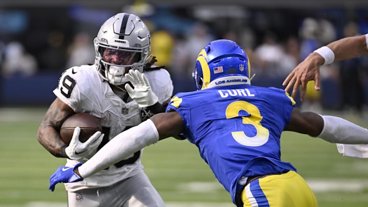 Oct 20, 2024; Inglewood, California, USA; Las Vegas Raiders wide receiver DJ Turner (19) runs after catching a pass against Los Angeles Rams safety Kamren Curl (3) in the second half at SoFi Stadium. Mandatory Credit: Alex Gallardo-Imagn Images Oct 20, 2024; Inglewood, California, USA; Las Vegas Raiders wide receiver DJ Turner (19) runs after catching a pass against Los Angeles Rams safety Kamren Curl (3) in the second half at SoFi Stadium. Mandatory Credit: Alex Gallardo-Imagn Images