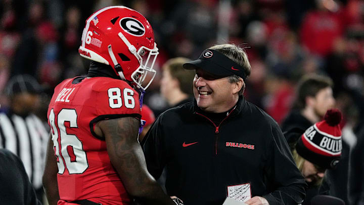 Georgia wide receiver Dillon Bell (86) speaks with Georgia coach Kirby Smart during warm ups before the start of a NCAA college football game against Georgia Tech in Athens, Ga., on Friday, Nov. 29, 2024. Georgia wide receiver Dillon Bell (86) speaks with Georgia coach Kirby Smart during warm ups before the start of a NCAA college football game against Georgia Tech in Athens, Ga., on Friday, Nov. 29, 2024.