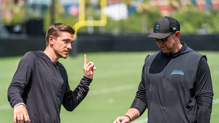 Jacksonville Jaguars general manager James Gladstone, left, talks with Jacksonville Jaguars head coach Liam Coen, right, after the. Jacksonville Jaguars’ mandatory minicamp Tuesday June 10, 2025 at the Miller Electric Center in Jacksonville, Fla. [Doug Engle/Florida Times-Union]
