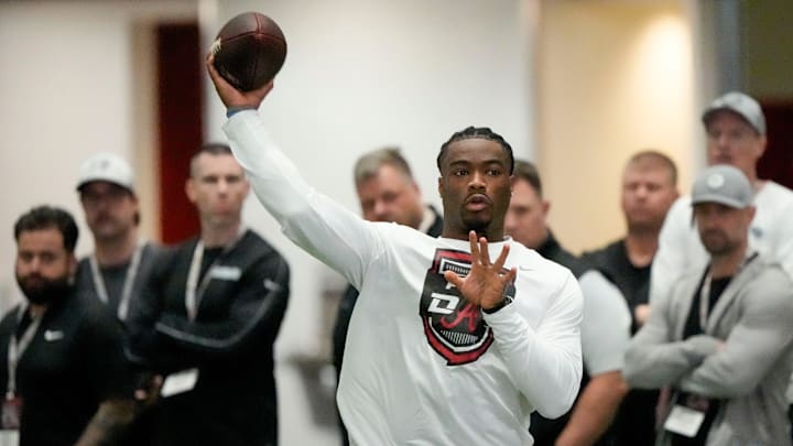 Mar 19, 2025; Tuscaloosa AL, USA; Quarterback Jalen Milroe throws for scouts at the University of Alabama Pro Day as several Crimson Tide players worked out for NFL teams in the Hank Crisp Indoor Practice Facility. Mar 19, 2025; Tuscaloosa AL, USA; Quarterback Jalen Milroe throws for scouts at the University of Alabama Pro Day as several Crimson Tide players worked out for NFL teams in the Hank Crisp Indoor Practice Facility.