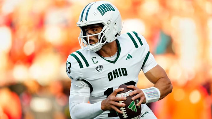Ohio Bobcats quarterback Parker Navarro (13) looks for an open teammate, Thursday, August 28, 2025.