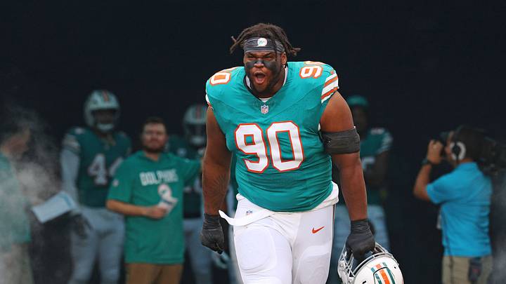Dec 21, 2025; Miami Gardens, Florida, USA; Miami Dolphins defensive tackle Kenneth Grant (90) enters the field before the game against the Cincinnati Bengals at Hard Rock Stadium. Mandatory Credit: Nathan Ray Seebeck-Imagn Images Dec 21, 2025; Miami Gardens, Florida, USA; Miami Dolphins defensive tackle Kenneth Grant (90) enters the field before the game against the Cincinnati Bengals at Hard Rock Stadium. Mandatory Credit: Nathan Ray Seebeck-Imagn Images