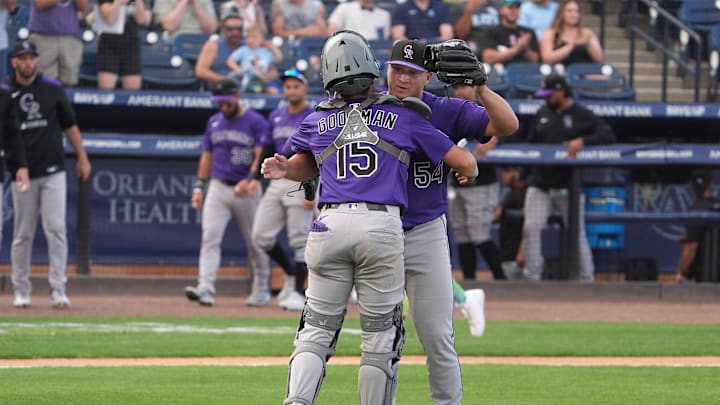 Mar 29, 2025; Tampa, Florida, USA; Colorado Rockies relief pitcher Seth Halvorsen (54) celebrates with catcher Hunter Goodman (15) after defeating the Tampa Bay Rays at George M. Steinbrenner Field. Mandatory Credit: Dave Nelson-Imagn Images