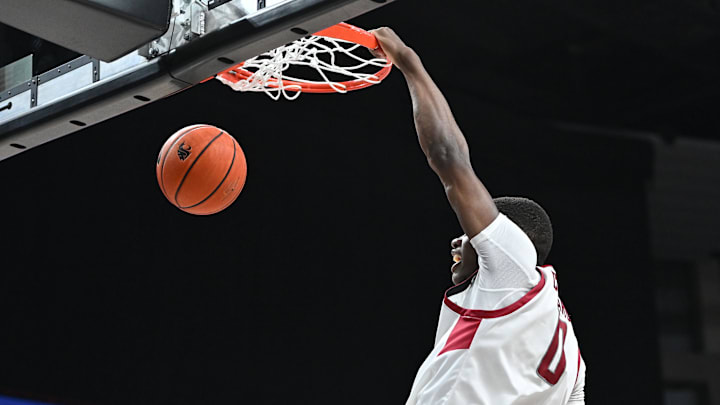 Nov 21, 2024; Spokane, Washington, USA; Duke basketball transfer Cedric Coward (0) dunks the ball against the Eastern Washington Eagles in the second half at Spokane Veterans Memorial Arena. 