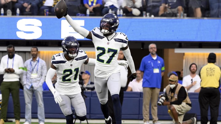 Nov 19, 2023; Inglewood, California, USA; Seattle Seahawks cornerback Riq Woolen (27) celebrates making an interception against the Los Angeles Rams in the fourth quarter at SoFi Stadium.
