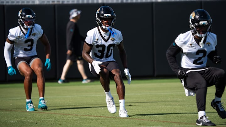 Jacksonville Jaguars cornerback Tyson Campbell (3), Jacksonville Jaguars cornerback Montaric Brown (30) and Jacksonville Jaguars cornerback Jourdan Lewis (2) runs through a drill during the Jacksonville Jaguars’ third mandatory minicamp Thursday June 12, 2025 at the Miller Electric Center in Jacksonville, Fla. [Doug Engle/Florida Times-Union]