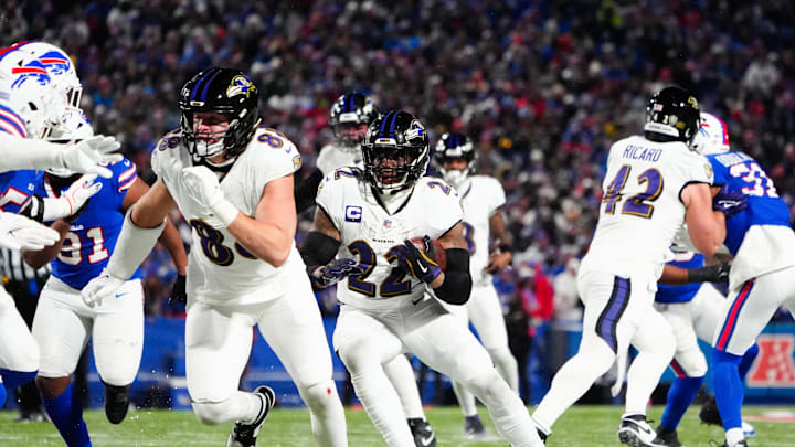 Jan 19, 2025; Orchard Park, New York, USA; Baltimore Ravens running back Derrick Henry (22) runs the ball during the third quarter against the Buffalo Bills in a 2025 AFC divisional round game at Highmark Stadium. Mandatory Credit: Gregory Fisher-Imagn Images