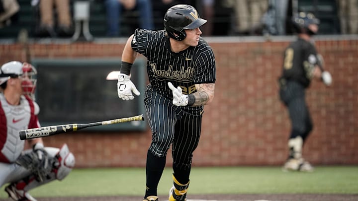 Vanderbilt left fielder Braden Holcomb (26) hits an RBI-double against Oklahoma during the fourth inning at Hawkins Field in Nashville, Tenn., Thursday, April 9, 2026.