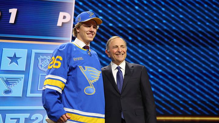 Jun 26, 2026; Buffalo, New York, USA; Tynan Lawrence poses beside NHL commissioner Gary Bettman after being selected with the eleventh pick in the first round of the 2026 NHL Draft by the St. Louis Blues at KeyBank Center. Mandatory Credit: Timothy T. Ludwig-Imagn Images Jun 26, 2026; Buffalo, New York, USA; Tynan Lawrence poses beside NHL commissioner Gary Bettman after being selected with the eleventh pick in the first round of the 2026 NHL Draft by the St. Louis Blues at KeyBank Center. Mandatory Credit: Timothy T. Ludwig-Imagn Images