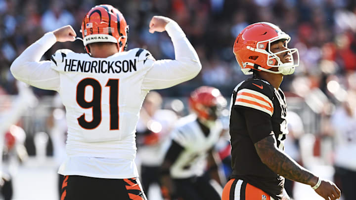 Oct 20, 2024; Cleveland, Ohio, USA; Cincinnati Bengals defensive end Trey Hendrickson (91) celebrates an interception as Cleveland Browns quarterback Dorian Thompson-Robinson (17) walks off the field during the second half at Huntington Bank Field. Mandatory Credit: Ken Blaze-Imagn Images