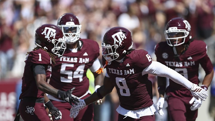 Sep 27, 2025; College Station, Texas, USA; Texas A&M Aggies running back Le'Veon Moss (8) celebrats with wide receiver Mario Craver (1) after a touchdown during the first quarter against the Auburn Tigers at Kyle Field. Mandatory Credit: Troy Taormina-Imagn Images Sep 27, 2025; College Station, Texas, USA; Texas A&M Aggies running back Le'Veon Moss (8) celebrats with wide receiver Mario Craver (1) after a touchdown during the first quarter against the Auburn Tigers at Kyle Field. Mandatory Credit: Troy Taormina-Imagn Images