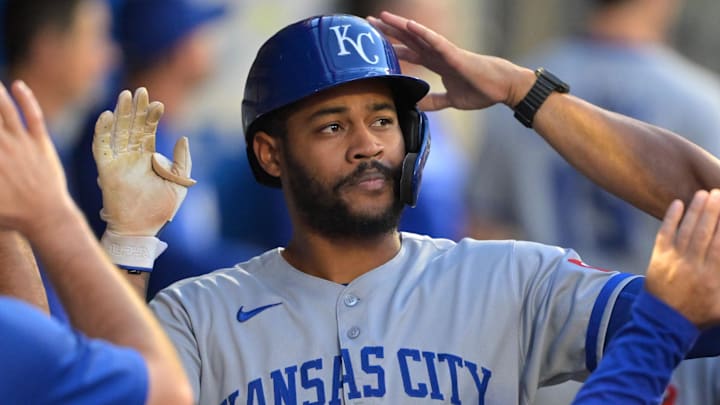 Sep 23, 2025; Anaheim, California, USA; Kansas City Royals third baseman Maikel Garcia (11) is greeted in the dugout after scoring on a single by shortstop Bobby Witt Jr. (7) during the first inning against the Los Angeles Angels at Angel Stadium. Mandatory Credit: Jayne Kamin-Oncea-Imagn Images Sep 23, 2025; Anaheim, California, USA; Kansas City Royals third baseman Maikel Garcia (11) is greeted in the dugout after scoring on a single by shortstop Bobby Witt Jr. (7) during the first inning against the Los Angeles Angels at Angel Stadium. Mandatory Credit: Jayne Kamin-Oncea-Imagn Images