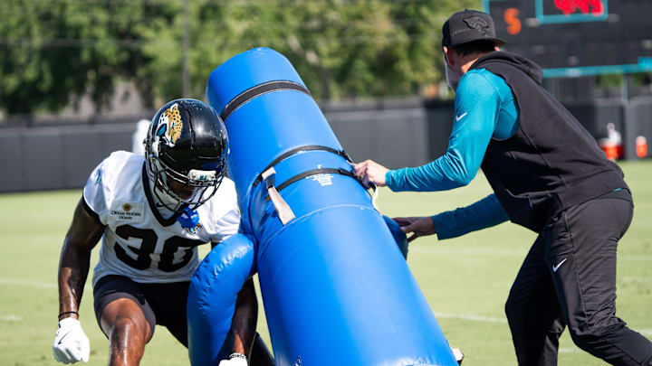 Jacksonville Jaguars cornerback Montaric Brown (30) punches the ball out of a tackling dummy while running drills during the Jacksonville Jaguars’ third mandatory minicamp Thursday June 12, 2025 at the Miller Electric Center in Jacksonville, Fla. [Doug Engle/Florida Times-Union]