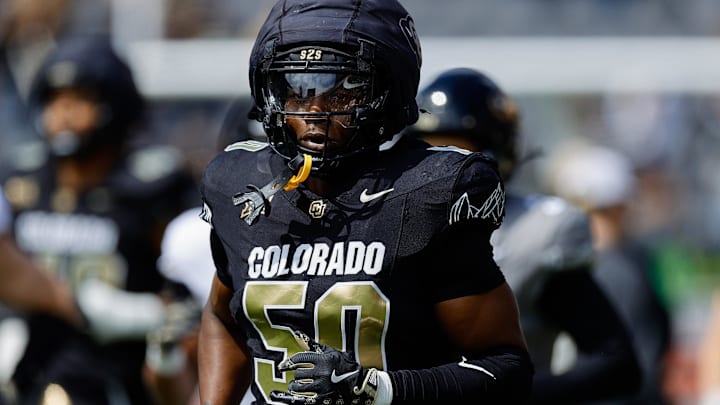Apr 19, 2025; Boulder, CO, USA; Colorado Buffaloes linebacker Reginald Hughes (50) during the spring game at Folsom Field. Mandatory Credit: Isaiah J. Downing-Imagn Images Apr 19, 2025; Boulder, CO, USA; Colorado Buffaloes linebacker Reginald Hughes (50) during the spring game at Folsom Field. Mandatory Credit: Isaiah J. Downing-Imagn Images