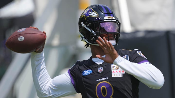 Jul 23, 2025; Owings Mills, MD, USA; Baltimore Ravens quarterback Lamar Jackson (8) warms up during training camp at Under Armour Performance Center. Mandatory Credit: Mitch Stringer-Imagn Images