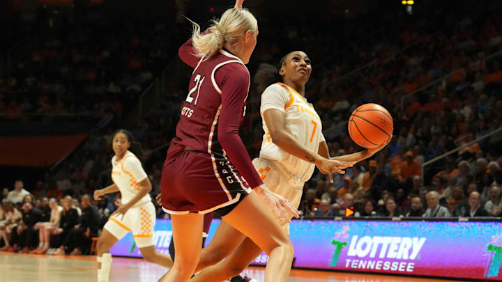 Tennessee's Samara Spencer (7) tries to score while guarded by South Carolina's Chloe Kitts (21) in an NCAA college basketball game on Monday, Jan. 27, 2025, in Knoxville, Tenn.