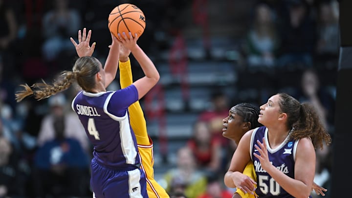 Mar 29, 2025; Spokane, WA, USA; Kansas State Wildcats guard Serena Sundell (4) shoots against USC Trojans guard Kennedy Smith (11) during the second half of a Sweet 16 NCAA Tournament basketball game at Spokane Arena. Mandatory Credit: James Snook-Imagn Images