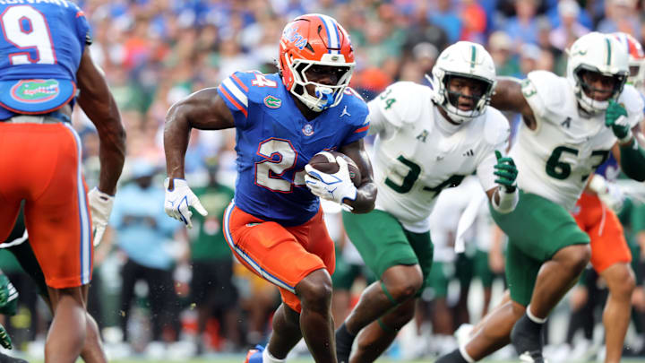 Sep 6, 2025; Gainesville, Florida, USA; Florida Gators running back Ja'Kobi Jackson (24) runs with the ball against the South Florida Bulls during the second quarter at Ben Hill Griffin Stadium. Mandatory Credit: Kim Klement Neitzel-Imagn Images
