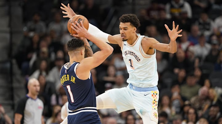 Jan 4, 2025; San Antonio, Texas, USA; San Antonio Spurs center Victor Wembanyama (1) pressures Denver Nuggets forward Michael Porter Jr. (1) during the first half at Frost Bank Center. Mandatory Credit: Scott Wachter-Imagn Images Jan 4, 2025; San Antonio, Texas, USA; San Antonio Spurs center Victor Wembanyama (1) pressures Denver Nuggets forward Michael Porter Jr. (1) during the first half at Frost Bank Center. Mandatory Credit: Scott Wachter-Imagn Images