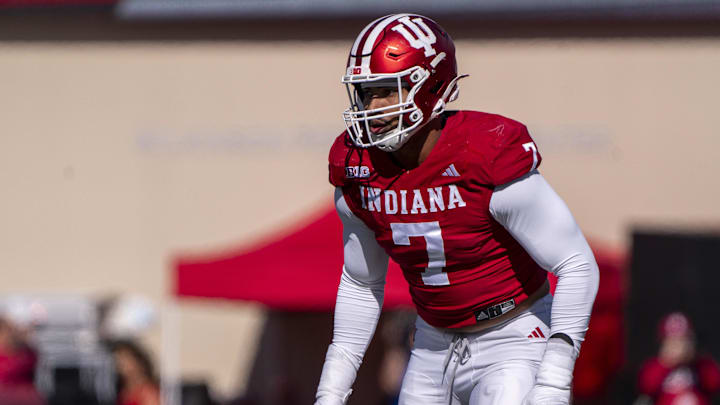Oct 26, 2024; Bloomington, Indiana, USA; Indiana Hoosiers defensive lineman Jacob Mangum-Farrar (7) prepares for a snap during the third quarter against the Washington Huskies at Memorial Stadium. Mandatory Credit: Jacob Musselman-Imagn Images