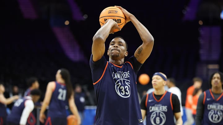 Mar 19, 2026; Philadelphia, PA, USA; Virginia Cavaliers center Ugonna Onyenso (33) shoots during a practice session ahead of the first round of the men's 2026 NCAA Tournament at Xfinity Mobile Arena. Mandatory Credit: Bill Streicher-Imagn Images