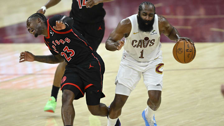 Apr 29, 2026; Cleveland, Ohio, USA; Toronto Raptors guard Jamal Shead (23) defends Cleveland Cavaliers guard James Harden (1) in the fourth quarter of game five of the first round of the 2026 NBA Playoffs at Rocket Arena. Mandatory Credit: David Richard-Imagn Images