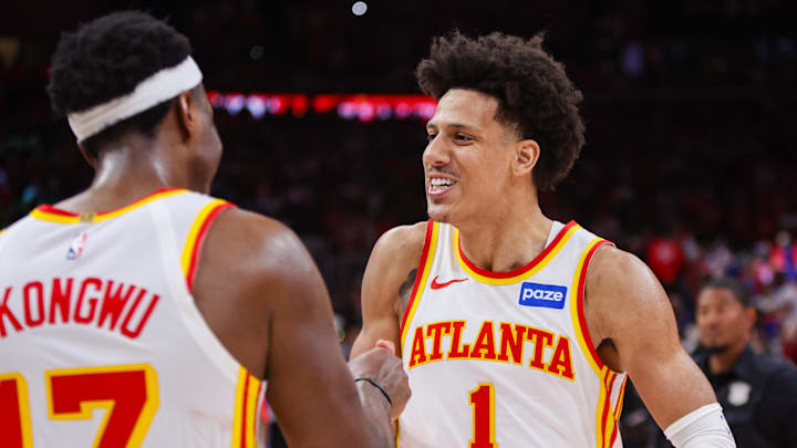 Apr 23, 2026; Atlanta, Georgia, USA; Atlanta Hawks forward Jalen Johnson (1) celebrates with forward Onyeka Okongwu (17) after a victory over the New York Knicks in game three of the first round of the 2026 NBA Playoffs at State Farm Arena. Mandatory Credit: Brett Davis-Imagn Images