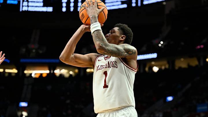 Mar 19, 2026; Portland, OR, USA; Arkansas Razorbacks guard Meleek Thomas (1) shoots in the second half against the Hawaii Rainbow Warriors during a first round game of the men's 2026 NCAA Tournament at Moda Center. Mandatory Credit: Craig Strobeck-Imagn Images