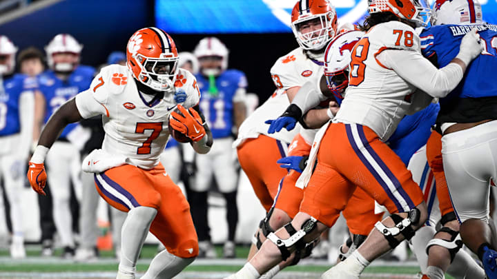 Dec 7, 2024; Charlotte, NC, USA; Clemson Tigers running back Phil Mafah (7) runs during the third quarter against the Southern Methodist Mustangs in the 2024 ACC Championship game at Bank of America Stadium. 
